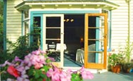 French doors from the room open onto a sunny deck